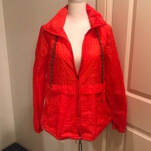 FREE PEOPLE lightweight orange rain jacket☔️